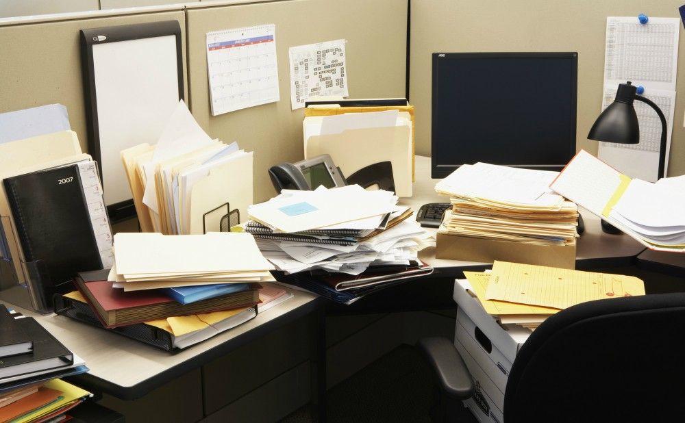 disorganized-desk-at-property-management-company 